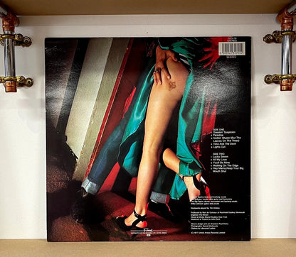 Dr. Feelgood – Sneakin' Suspicion
