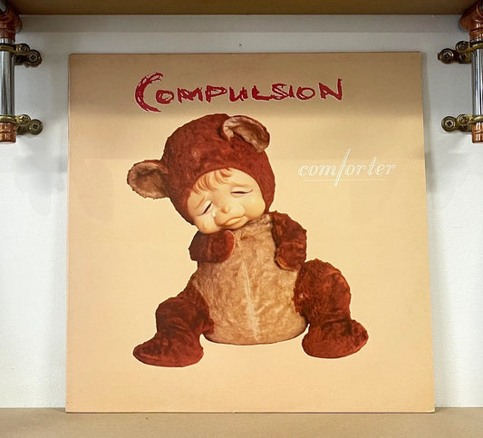 Compulsion – Comforter